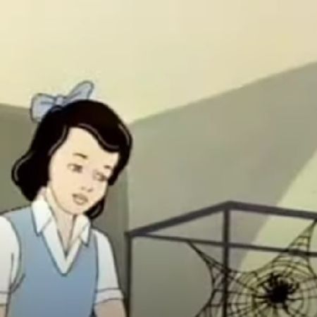 Young Jessica Drew is looking at the spider in the glass cage.